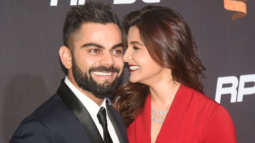 Virat Kohli and Anushka Sharma share a moment on the red carpet of the Indian Sports Honours in Mumbai.