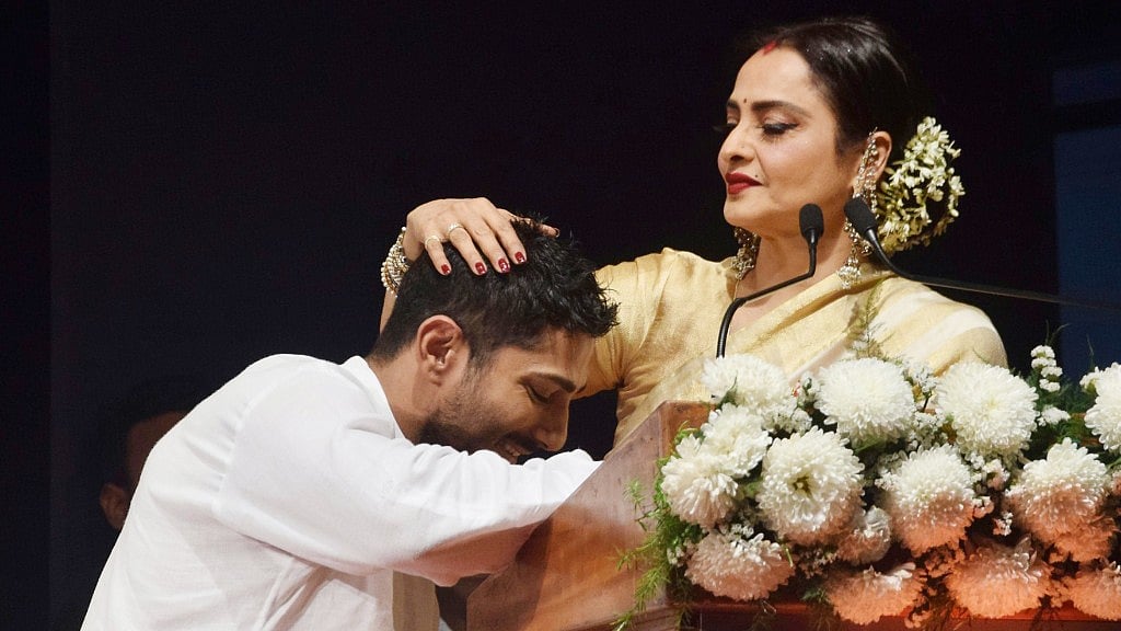 Rekha and Prateik Babbar share a moment at the Smita Patil Memorial Award ceremony.