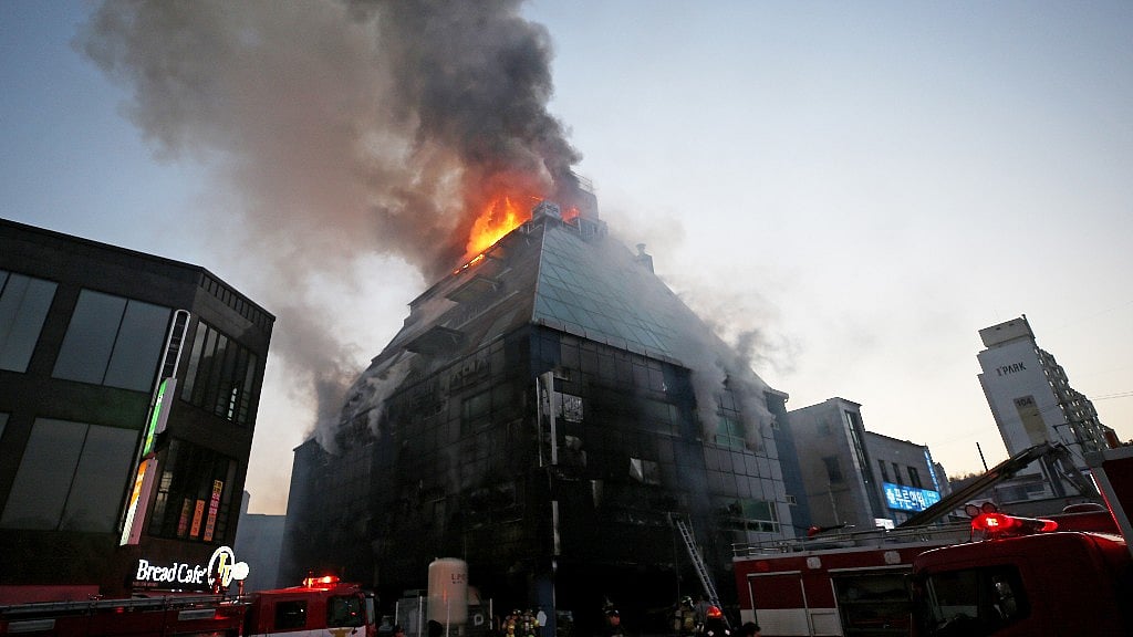 <p>It reportedly took only seven minutes for the entire building to be engulfed in smoke and flames.</p>