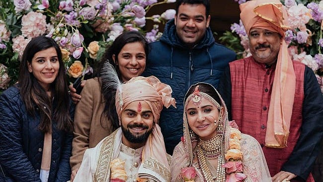 Virat Kohli &amp; Anushka Sharma with the dream team that planned their wedding.&nbsp;