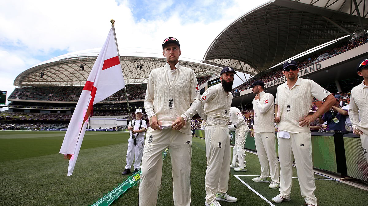 In this Dec. 3, 2017, file photo, England’s captain Joe Root, center, prepares to lead his team onto the ground for the second day of their Ashes test match against Australia in Adelaide, Australia. Root’s first Ashes tour as England cricket captain has been more eventful than he expected, just not in the way he had hoped.&nbsp;