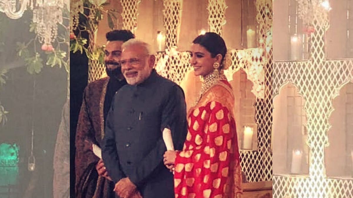 <p>PM&nbsp; Modi with Virat Kohli and Anushka Sharma.</p>
