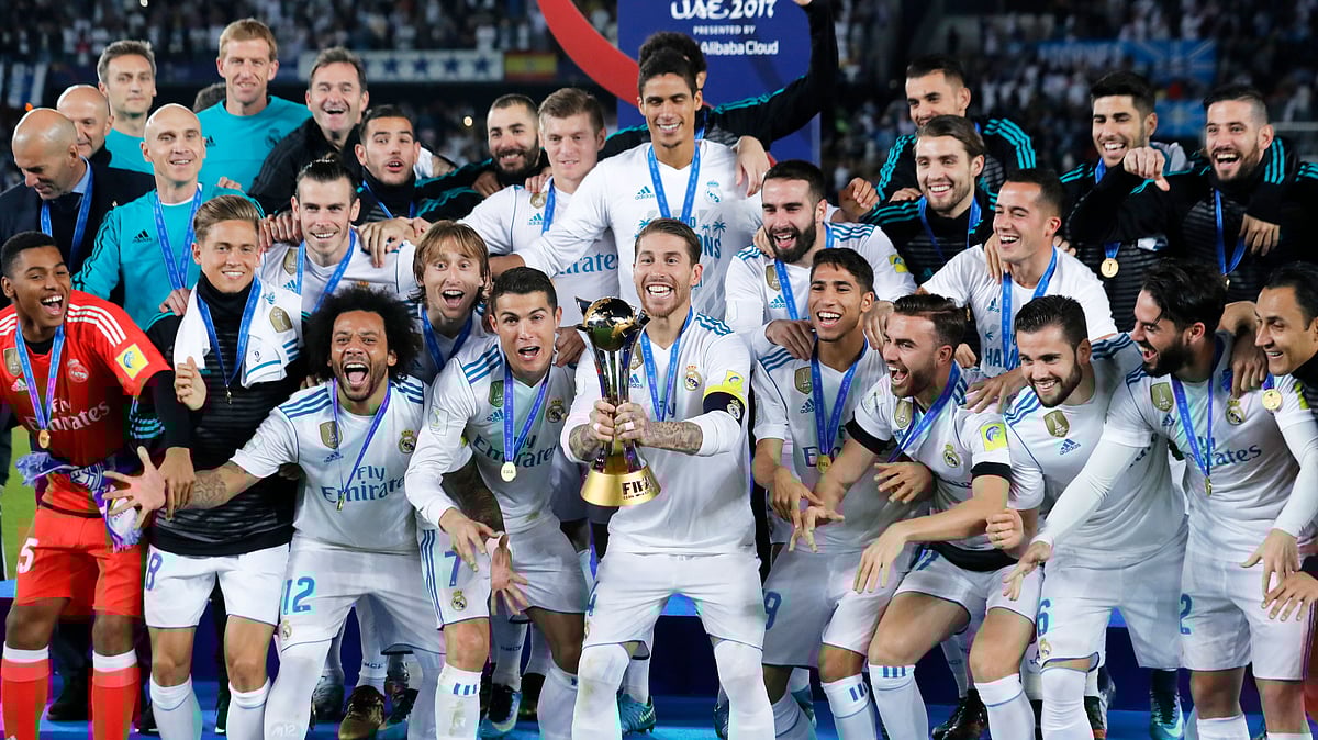 Real Madrid’s Sergio Ramos holds the trophy after winning the Club World Cup final.
