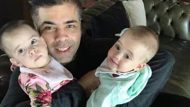 Karan Johar being the doting dad to his twins.&nbsp;