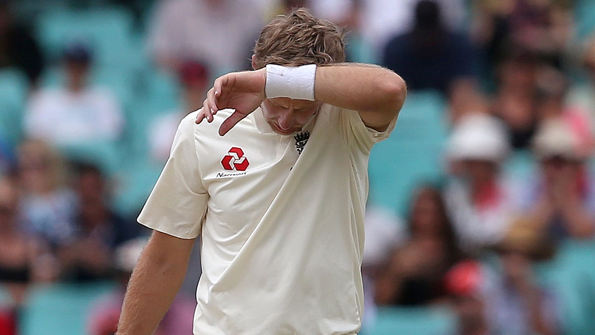England’s Joe Root wipes his face during Day 4 of the fifth Test against England.