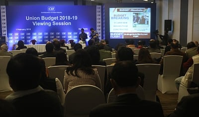 New Delhi: Industrialists Sunil Kant Munjal, Rakesh Bharti Mittal with others at CII headquarter watching Union Budget presented by Union Finance Minister Arun Jaitley in New Delhi on Feb. 1, 2018. (Photo: IANS)