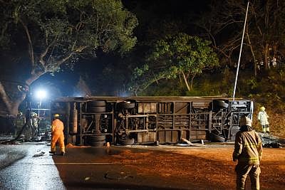 HONG KONG, Feb. 10, 2018 (Xinhua) -- Rescuers work at the accident site where a double-decker bus overturned in New Territories in Hong Kong Special Administrative Region, south China, Feb. 10, 2018. (Xinhua/Wang Shen/IANS)