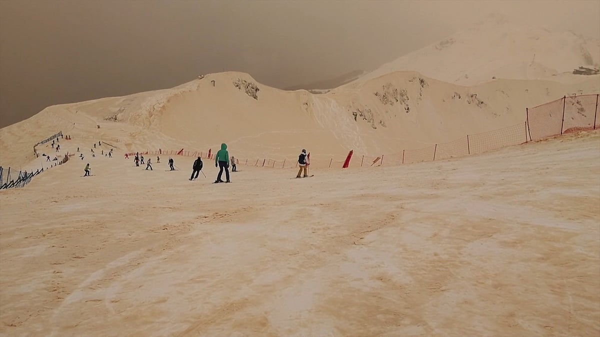 Skiers in Russia were in for a surprise when they saw their usual white slopes turn orange.