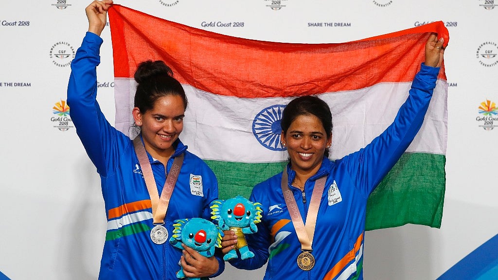 Tejaswini Sawant (right) and Anjum Moudgil with their medals in Gold Coast on Thursday.&nbsp;
