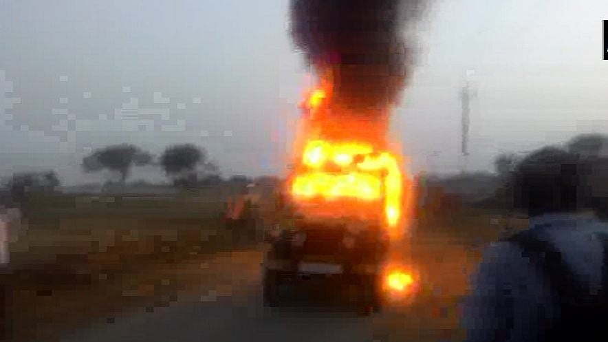 Demanding that the police arrest the culprits responsible for the double murder, an angry mob set a police jeep on fire.&nbsp;