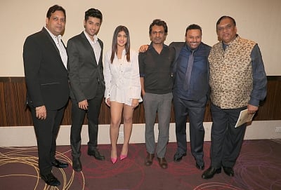 Mumbai: Producers Deepak Mukut and Kamal Mukut, director Anil Sharma, actors Utkarsh Sharma, Nawazuddin Siddiqui and Ishita at the wrap up party of film "Genius" in Mumbai on March 7, 2018. (Photo: IANS)