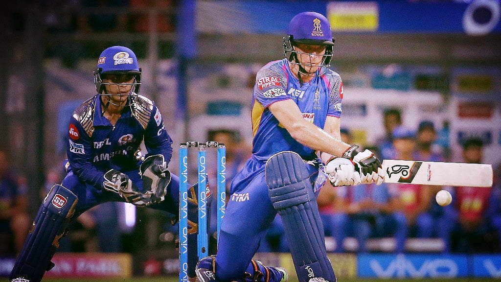 Jos Buttler plays a reverse sweep against Mumbai Indians.