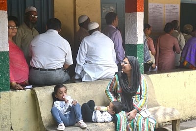 Bengaluru: Voters at a polling booth during Karnataka Assembly Polls in Bengaluru, on May 12, 2018. (Photo: IANS)