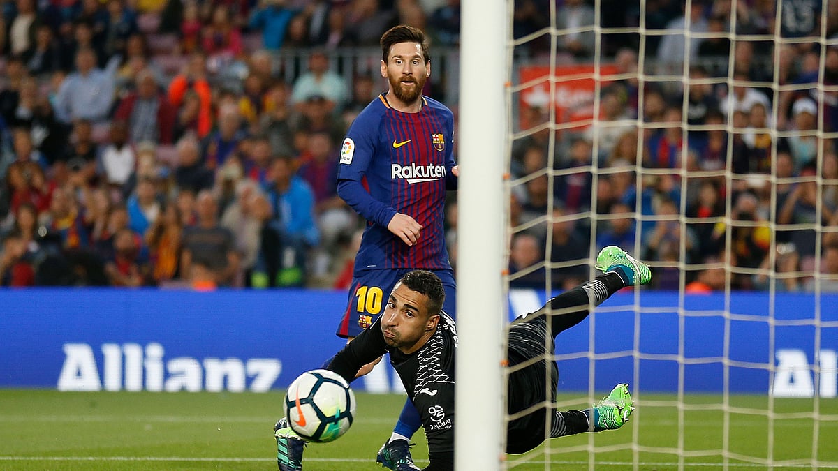 FC Barcelona’s Lionel Messi kicks the ball to score during the Spanish La Liga soccer match between FC Barcelona and Villarreal at the Camp Nou stadium in Barcelona, Spain, Wednesday, 9 May 2018.