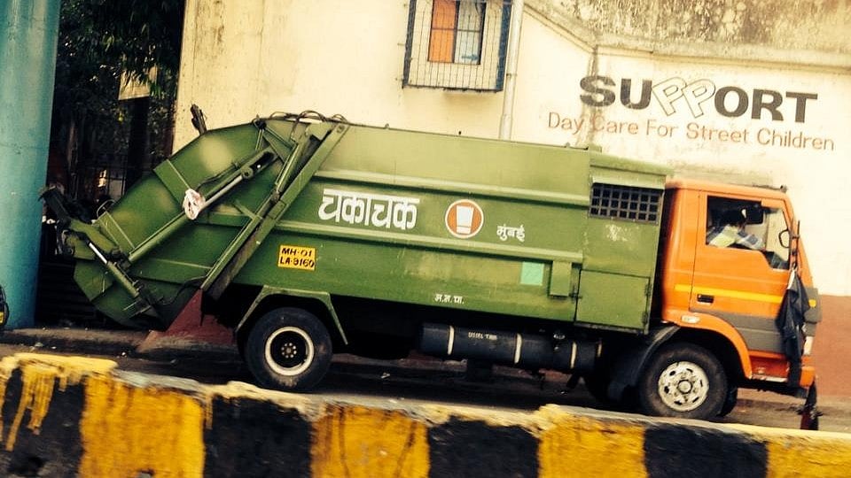 Representational image of a garbage compactor.