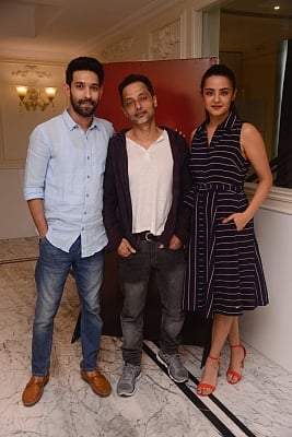 Mumbai: Actors Vikrant Massey, Surveen Chawla and Filmmaker Sujoy Ghosh at the launch of television show "Teen Paheliyan" in Mumbai on April 13, 2018 . (Photo: IANS)