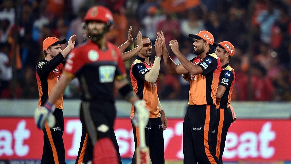 Sunrisers Hyderabad players celebrates the wicket of Virat Kohli against Royal Challengers Bangalore in Hyderabad on Monday.