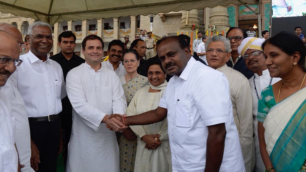 Congress President Rahul Gandhi greets Karnataka CM HD Kumaraswamy, as Mayawati and Sitaram Yechury look on.&nbsp;