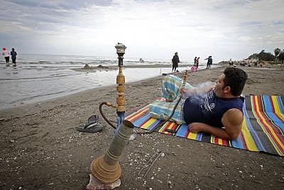 Posts with hashtags, such as #hookah or #shisha, on social media platforms may portray its use in an overwhelmingly positive manner despite its serious health risks, a new study suggests. (Xinhua/Ahmad Halabisaz/IANS)
