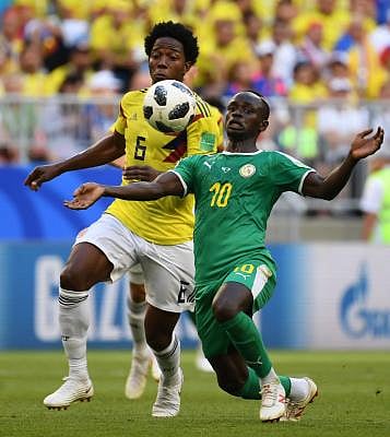 SAMARA, June 28, 2018 (Xinhua) -- Carlos Sanchez (L) of Colombia vies with Sadio Mane of Senegal during the 2018 FIFA World Cup Group H match between Colombia and Senegal in Samara, Russia, June 28, 2018. (Xinhua/Liu Dawei/IANS)