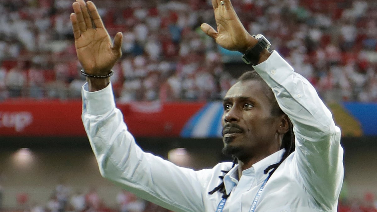 Aliou Cisse celebrates after Senegal’s win against Poland.