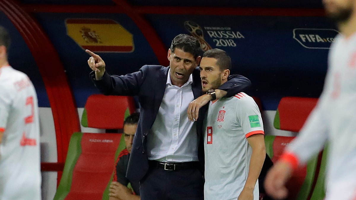 Spain head coach Fernando Hierro gestures as he speaks to his player Spain’s Koke during the group B match between Iran and Spain at the 2018 soccer World Cup in the Kazan Arena in Kazan, Russia, Wednesday, June 20, 2018.&nbsp;