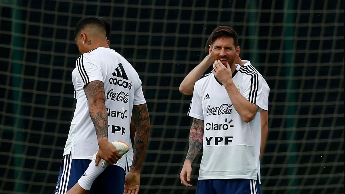 Argentina’s Lionel Messi, right, attends a team training session at the Sports Center FC Barcelona Joan Gamper. A source at Argentina’s football federation confirmed it had called off a match against Israel scheduled for Saturday.
