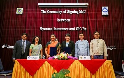 Myanmar: MoU signing ceremony between Myanma Insurance and General Insurance Corp (GIC Re) underway, in Myanmar on June 6, 2018. According to authorities, the General Insurance Corp of India (GIC) will assist Myanmar authorities in amending laws related to insurance and reinsurance and in expanding insurance services in the country. (Photo: IANS/Twitter/@IndiainMyanmar)