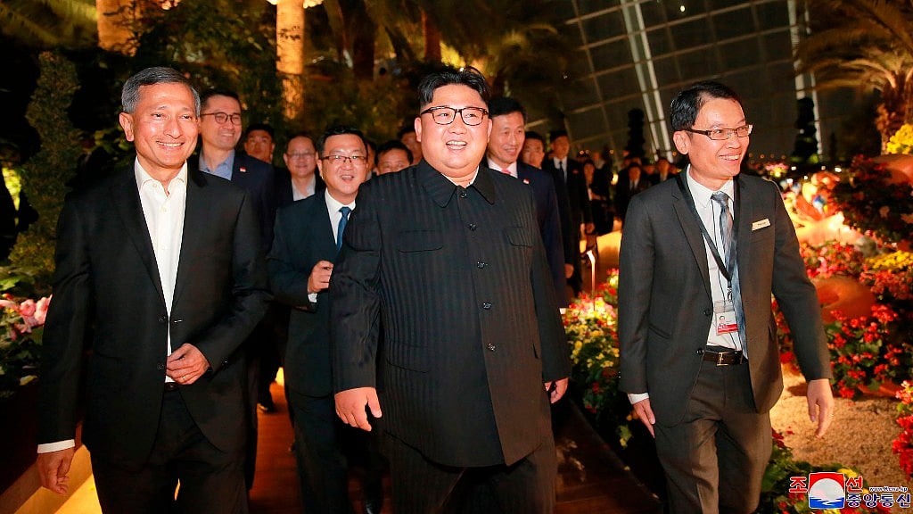 North Korean leader Kim Jong Un (centre), walks with Singapore’s Foreign Minister Vivian Balakrishnan (left), in Singapore, ahead of the summit.