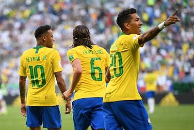 SAMARA, July 2, 2018 (Xinhua) -- Roberto Firmino (R) of Brazil celebrates scoring during the 2018 FIFA World Cup round of 16 match between Brazil and Mexico in Samara, Russia, July 2, 2018. Brazil won 2-0 and advanced to the quarter-final. (Xinhua/Li Ga/IANS)