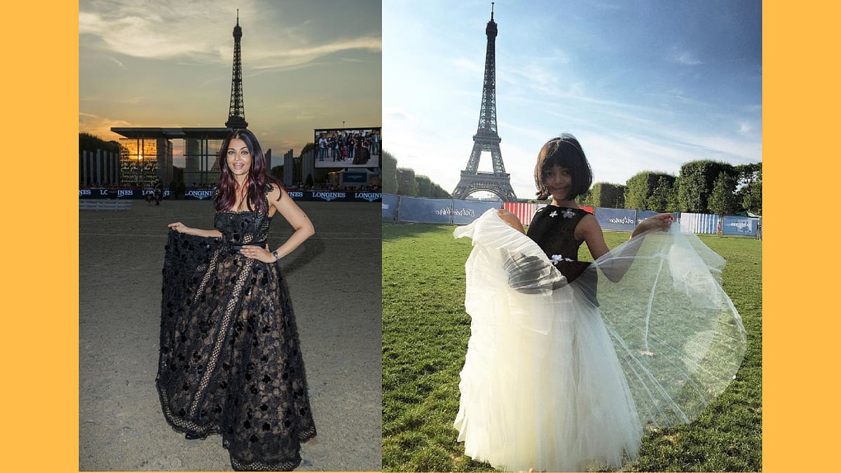 Aishwarya Rai Bachchan and Aaradhya pose near the Eiffel Tower.
