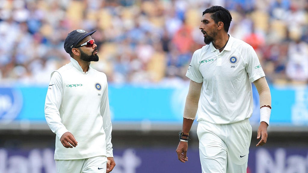 Virat Kohli shares a moment with Ishant Sharma.