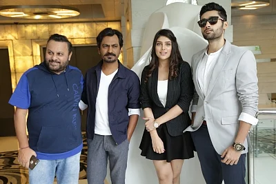 New Delhi: Director Anil Sharma, actors Nawazuddin Siddiqui, Utkarsh Sharma and Ishitha Chauhan during promotion of an upcoming film