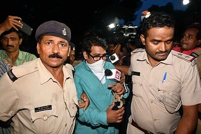 Patna: NGO secretary Chirantan Kumar one of the accused in Patna Aasra Shelter Home Case arrested by Police being produced before the court; in Patna on Aug 13, 2018. (Photo: IANS)