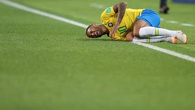 MOSCOW, June 27, 2018 (Xinhua) -- Neymar of Brazil falls down during the 2018 FIFA World Cup Group E match between Brazil and Serbia in Moscow, Russia, June 27, 2018. Brazil won 2-0 and advanced to the round of 16. (Xinhua/Cao Can/IANS)