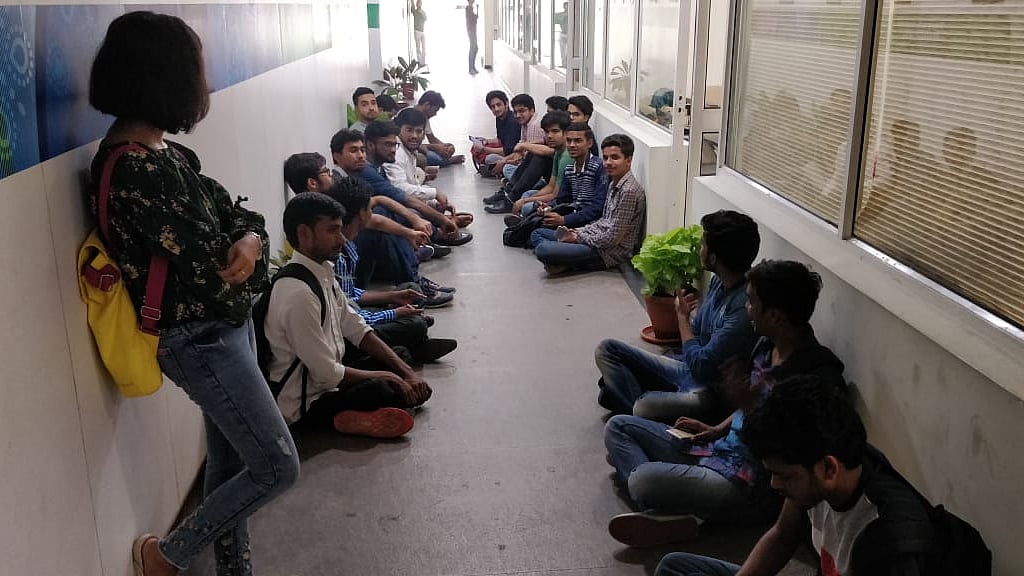 Students of Delhi School of Journalism stage a protest for better facilites.