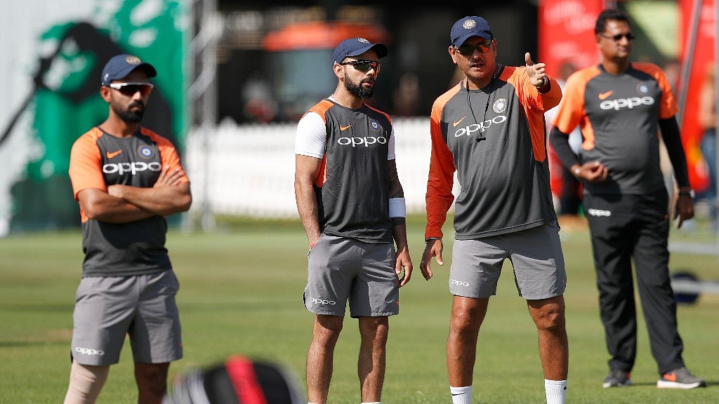 India’s head coach Ravi Shastri talks to his team captain Virat Kohli during a training session at Lord’s Cricket ground in London on Tuesday.&nbsp;