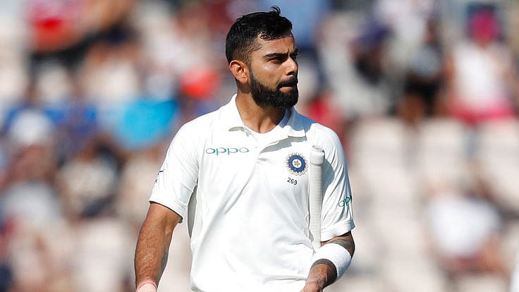 Virat Kohli walks off the field after getting out on Day 4 of the fourth Test against England.