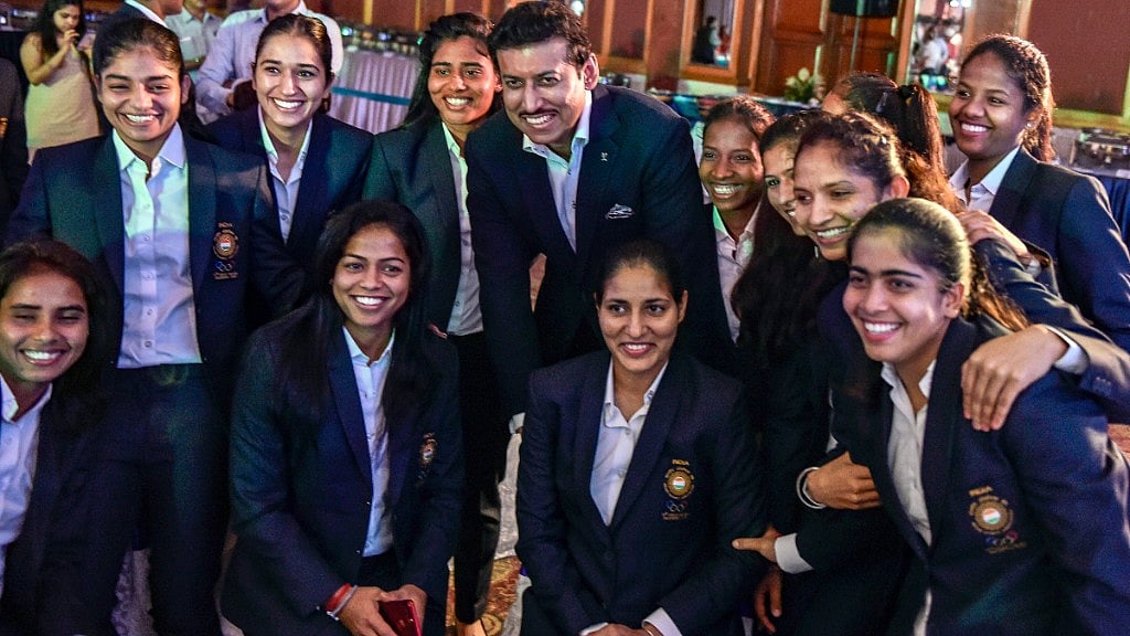 Union MoS Sports and Youth Affairs Rajyavardhan Singh Rathore with the players of Indian women’s hockey team Asian Games during a felicitation programme in New Delhi.