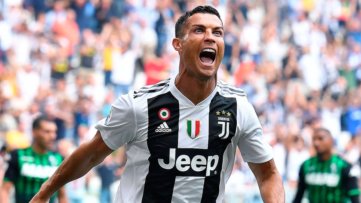Juventus’ Cristiano Ronaldo celebrates after scoring during a Serie A soccer match between Juventus and Sassuolo, at the Allianz Stadium in Turin, Italy, Sunday, Sept. 16, 2018.&nbsp;