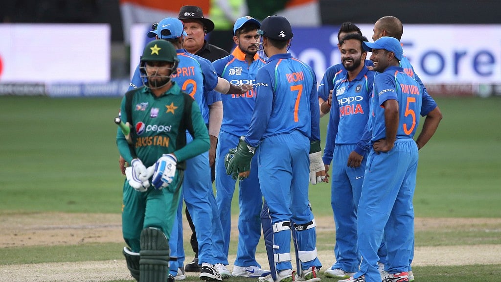 India’s Kedar Jadhav celebrates with teammates the dismissal of a Pakistan batsman during their Asia Cup match in Dubai, United Arab Emirates on Wednesday.&nbsp;