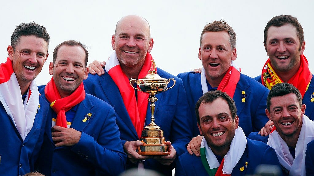 Europe team captain Thomas Bjorn (centre) holds the trophy as he celebrates with his team after Europe won the Ryder Cup on the final day of the 42nd Ryder Cup at Le Golf National in Saint-Quentin-en-Yvelines in France on Sunday.