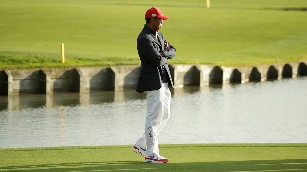 Tiger Woods of the US attends the closing ceremony after Europe won the Ryder Cup on the final day of the 42nd Ryder Cup at Le Golf National in .