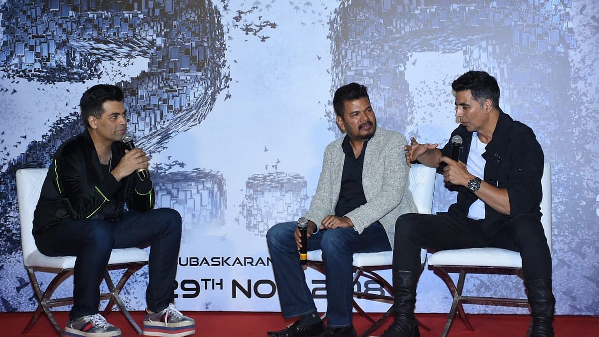 Karan Johar, Shankar and Akshay Kumar engage in a discussion at the event.