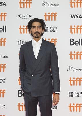 TORONTO, Sept. 8, 2018 (Xinhua) -- Actor Dev Patel poses for photos before the premiere of the film "Hotel Mumbai" during the 2018 Toronto International Film Festival in Toronto, Canada, Sept. 7, 2018. (Xinhua/Zou Zheng/IANS)