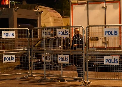 ISTANBUL, Oct. 15, 2018 (Xinhua) -- A Turkish policeman stands outside the Saudi consulate in Istanbul, Turkey, Oct. 15, 2018. A Turkish team entered the Saudi consulate in Istanbul on Monday evening to conduct a search over the disappearance of the Saudi journalist Jamal Khashoggi, live broadcast showed. (Xinhua/He Canling/IANS)