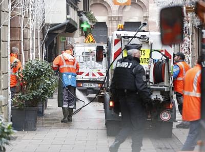 STRASBOURG, Dec. 12, 2018 (Xinhua) -- Municipal workers clean the site of attack in the center of Strasbourg, France on Dec. 12, 2018. French police are looking for a gunman after he killed at least four people and wounded 13 others Tuesday evening near a Christmas market in Strasbourg on the German border. (Xinhua/Ye Pingfan/IANS)