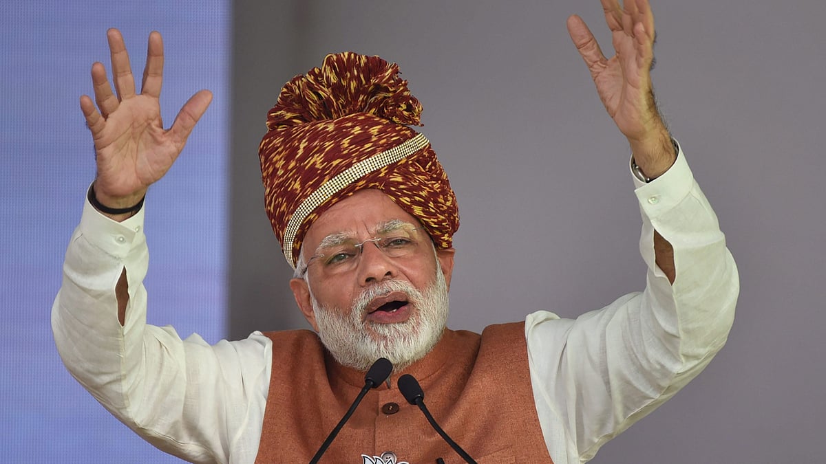 Prime Minister Narendra Modi addresses an election rally in Jodhpur on 3 December ahead of the state Assembly elections.