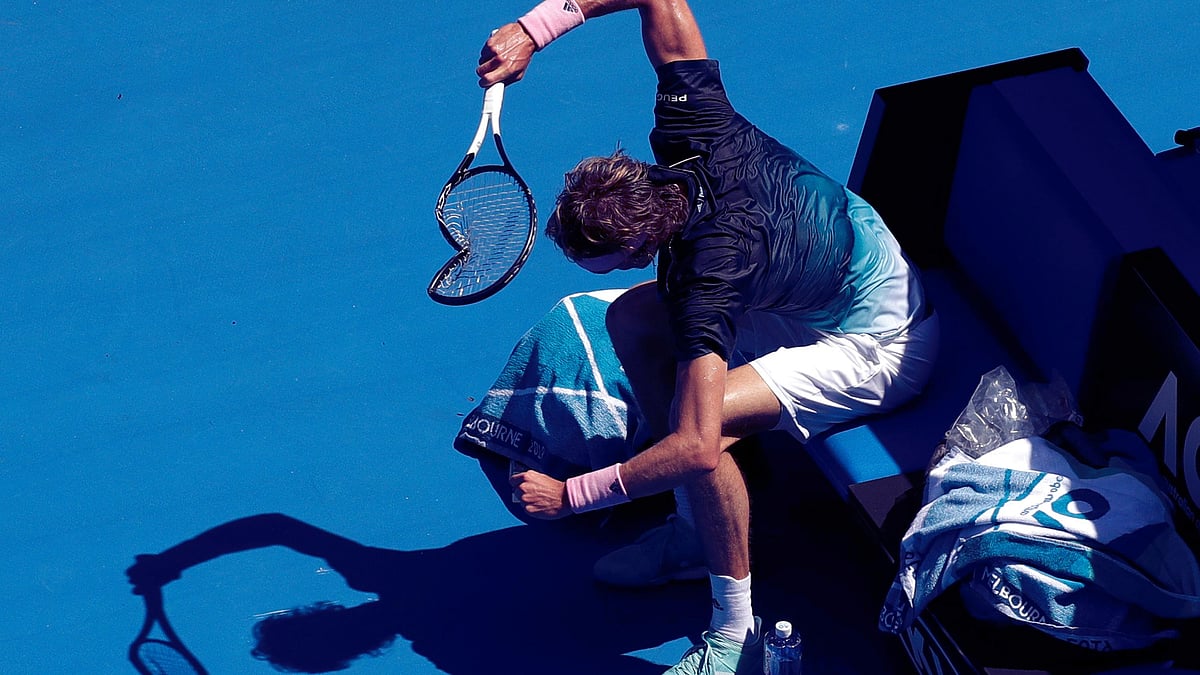 Alexander Zverev breaks his racket in frustration during his defeat to Grigor Dimitrov in the Australian Open round of 16.