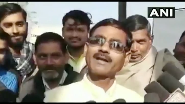 BJP MLA Vikram Saini talks to the media.